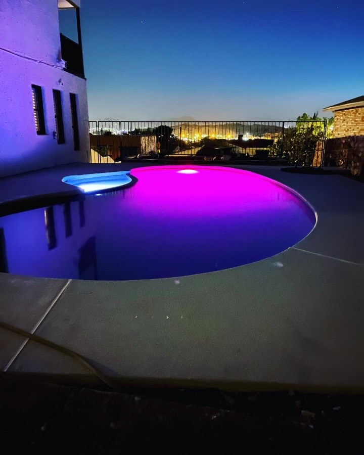 Beautiful pool with LED lighting at night